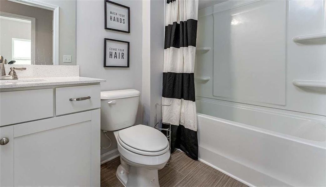 Furnished interior view inside a new home in Summerfield Place, Carrollton (Image 11). Furnished interior view inside a new home in Summerfield Place, Carrollton (Image 11).
