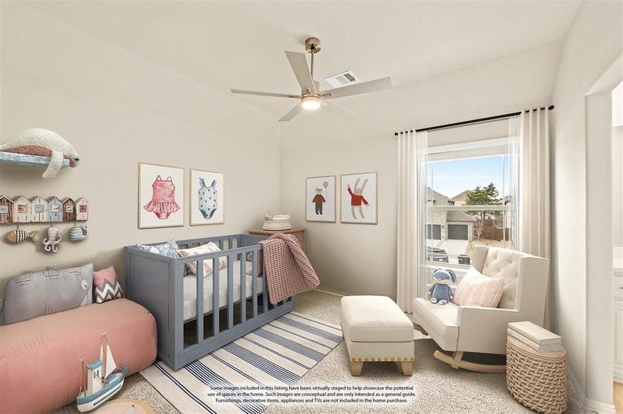 Carpeted bedroom with a ceiling fan