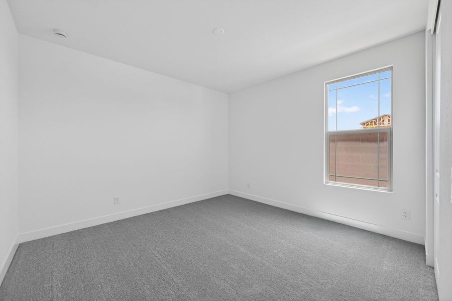 Spacious, unfurnished interior of a new home in Artisan at Asante, Surprise (Image 26).