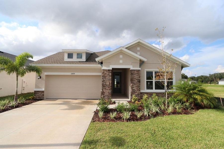 Front Exterior **Photos are of a Similar Home