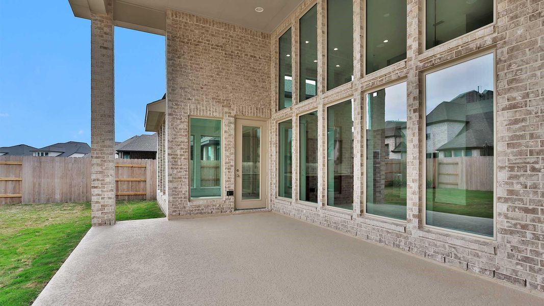 Exterior details and patio area of a home in Elyson 65', Katy (Image 3). Exterior details and patio area of a home in Elyson 65', Katy (Image 3).