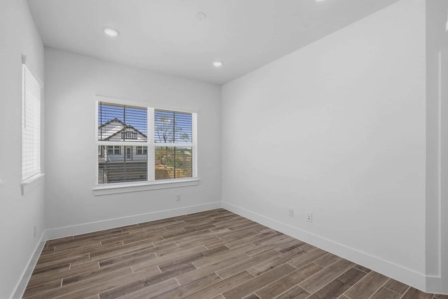Representative unfurnished interior of a home built from the Dillon by Chesmar Homes in Sienna Courtyard, Missouri City (Image 17).