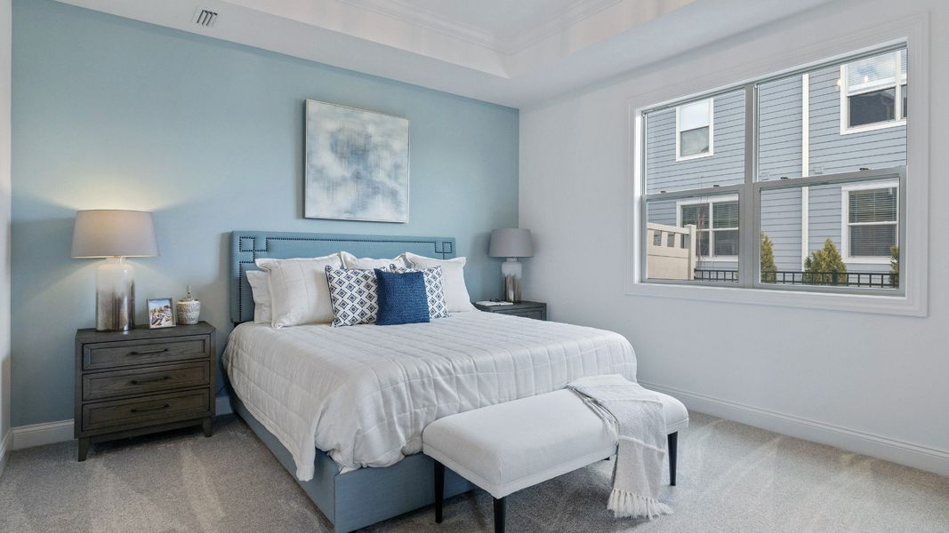 Representative furnished interior of a home built from the Cambridge by Epcon Communities in The Courtyards at Oak Grove, Durham (Image 15).