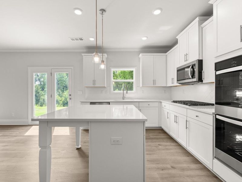 Furnished interior view inside a new home in Butner Estates, College Park (Image 9).