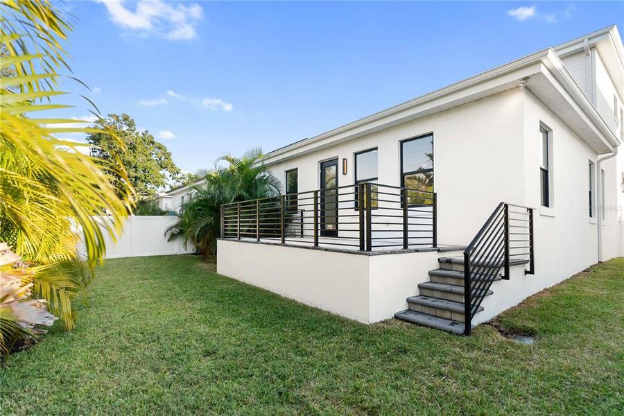 Exterior details and patio area of a home in , Sarasota (Image 29).