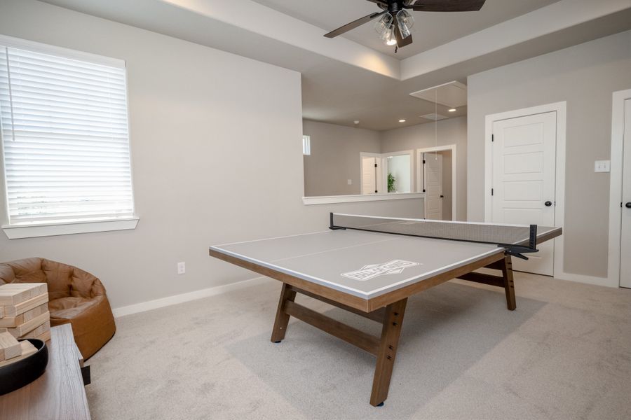 Furnished interior view inside a new home in Greens Prairie Reserve, College Station (Image 29).
