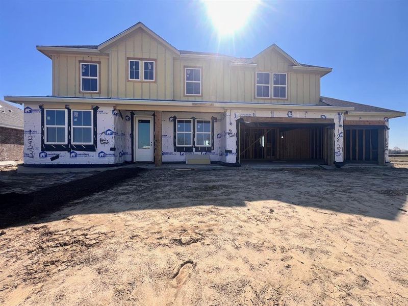 Two story home with 4 bedrooms, 3.5 baths, and 3 car garage.