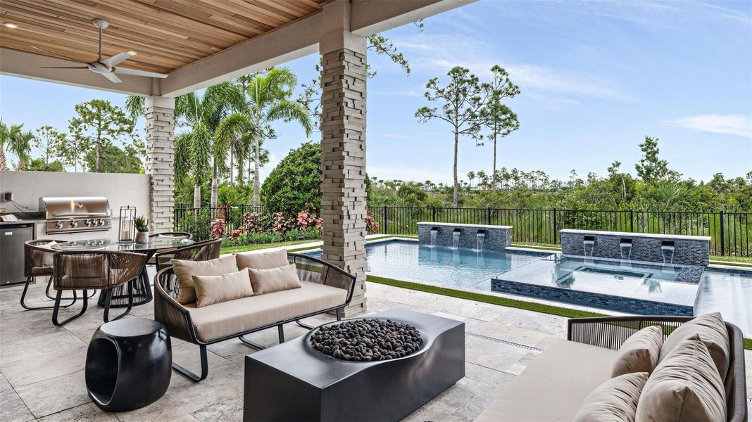 Exterior details and patio area of a home in L'Ambiance at Avenir, Palm Beach Gardens (Image 27).