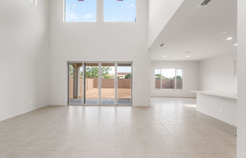 Spacious, unfurnished interior of a new home in Legado West, Queen Creek (Image 24).