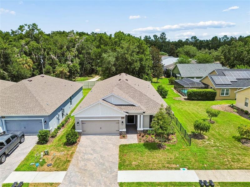 Front exterior of a new home in Cascades at Southern Hills, Brooksville, FL, highlighting curb appeal (Image 31).