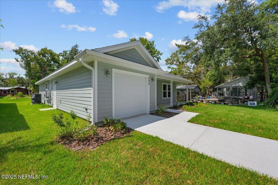 Front exterior of a new home in , Palatka, FL, highlighting curb appeal (Image 14).
