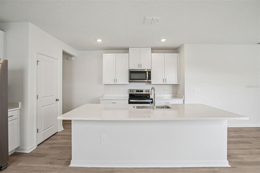 Furnished interior view inside a new home in Two Rivers - Premier Series, Zephyrhills (Image 6). Furnished interior view inside a new home in Two Rivers - Premier Series, Zephyrhills (Image 6).