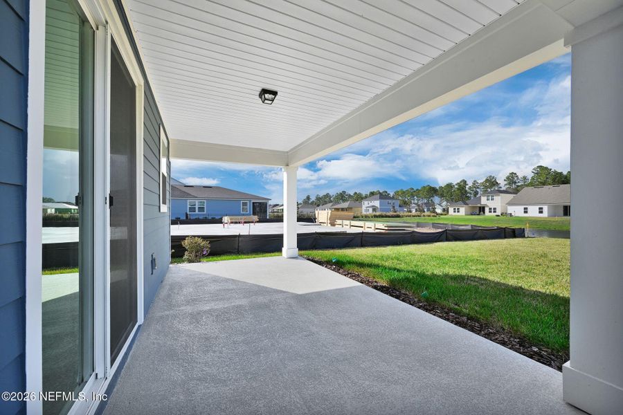 Exterior details and patio area of a home in Hyland Trail, Green Cove Springs (Image 24).