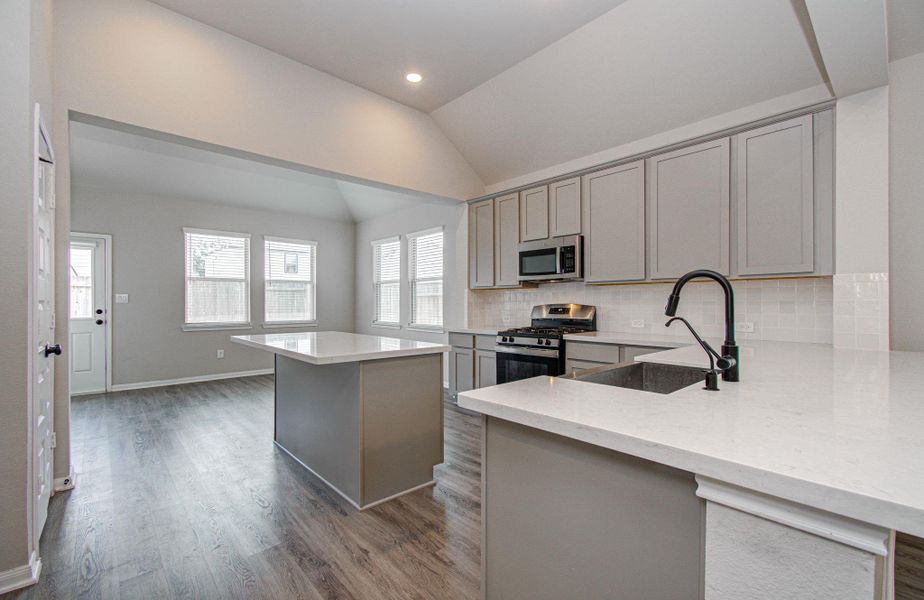 Wonderful spacious modern quartz island kitchen