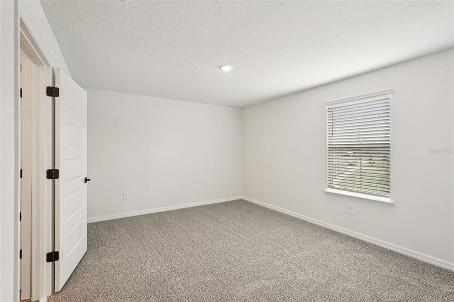 Spacious, unfurnished interior of a new home in Oakfield Trails - Signature Series, Parrish (Image 43).