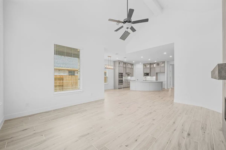 Representative unfurnished interior of a home built from the Madison by Chesmar Homes in Grange, Katy (Image 18).