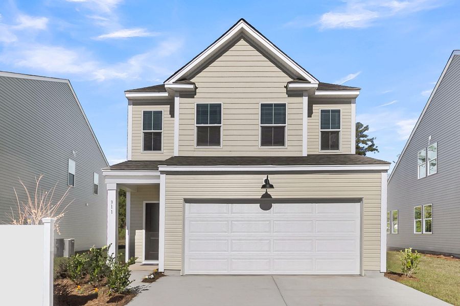 Front exterior of a new home in Wildcat Chase, Summerville, SC, highlighting curb appeal (Image 1).
