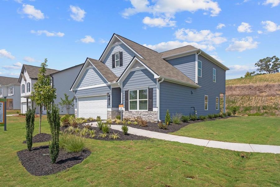 Front exterior of a new home in Victoria Heights, Dallas, GA, highlighting curb appeal (Image 2). Front exterior of a new home in Victoria Heights, Dallas, GA, highlighting curb appeal (Image 2).