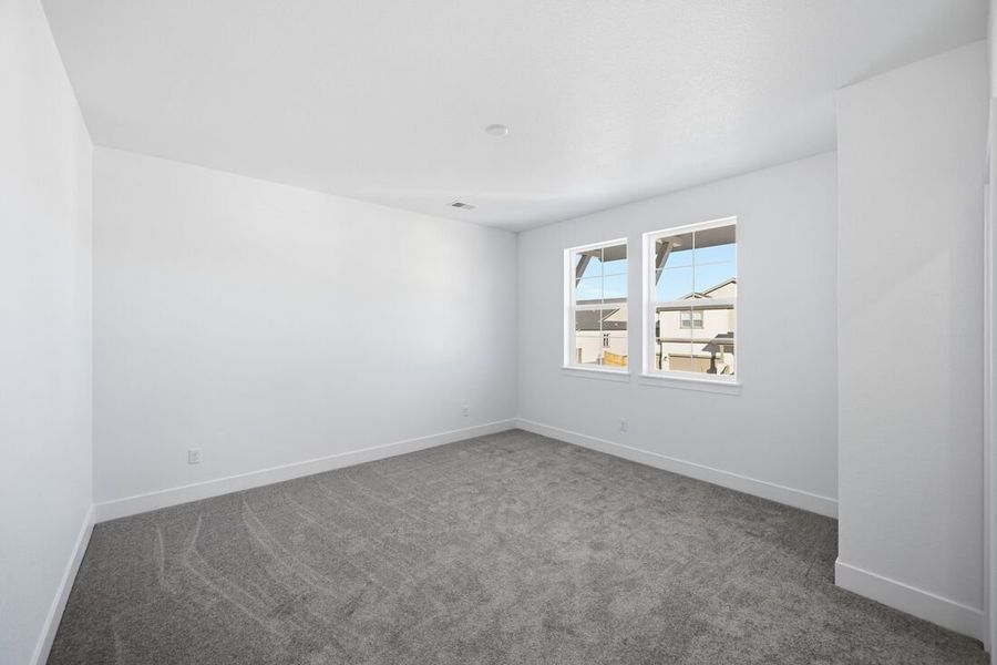 Spacious, unfurnished interior of a new home in Trailstone, Arvada (Image 24).
