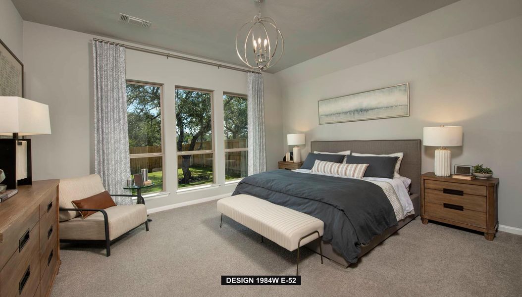 Bedroom featuring carpet floors and a chandelier
