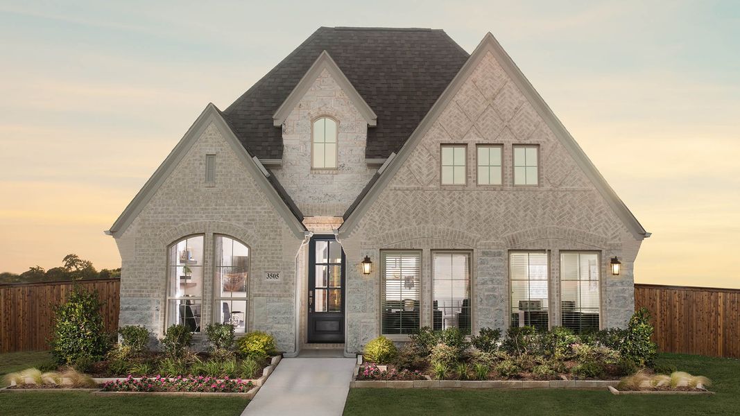 Front exterior of a new home in Lariat 45', Liberty Hill, TX, highlighting curb appeal (Image 18).