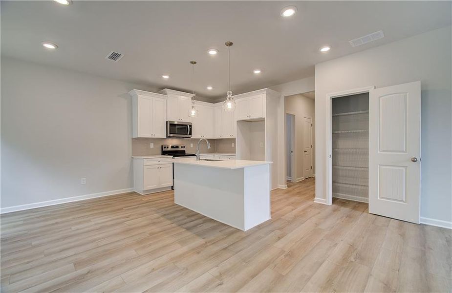 Furnished interior view inside a new home in Enclave at Evergreen, Fairburn (Image 3).