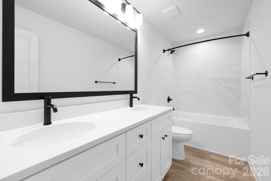 Furnished interior view inside a new home in , Huntersville (Image 8).