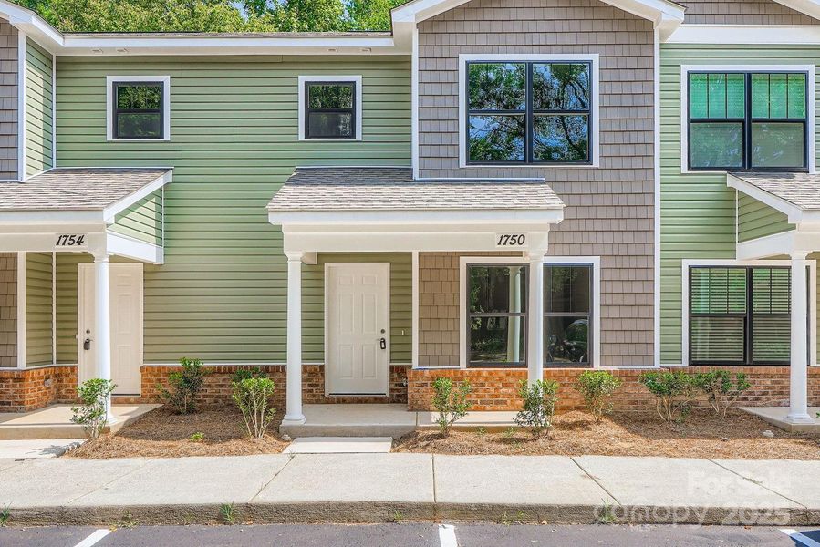 Front exterior of a new home in , Charlotte, NC, highlighting curb appeal (Image 2). Front exterior of a new home in , Charlotte, NC, highlighting curb appeal (Image 2).