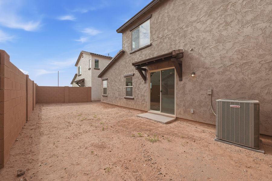 Exterior details and patio area of a home in Hawes Crossing, Mesa (Image 19).