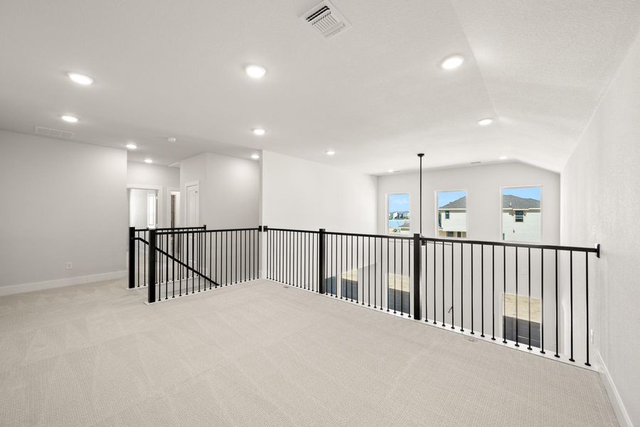 Spacious, unfurnished interior of a new home in The Retreat at Harvest, Argyle (Image 13).