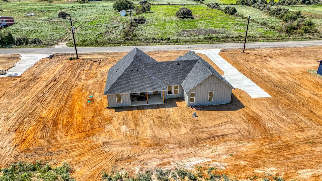 Representative exterior photo of a completed home built from the Loretta by Zeal Home Builders in Patti Lynn Hills, Paradise, TX (Image 27). Representative exterior photo of a completed home built from the Loretta by Zeal Home Builders in Patti Lynn Hills, Paradise, TX (Image 27).