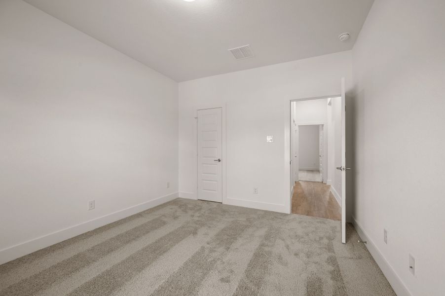 Spacious, unfurnished interior of a new home in Saddleback Estates, Boyd (Image 29).