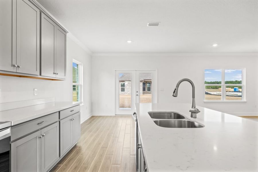 Furnished interior view inside a new home in Natureview, Freeport (Image 9).