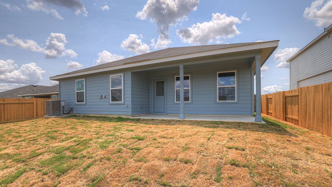 Front exterior of a new home in Trace, San Marcos, TX, highlighting curb appeal (Image 17).
