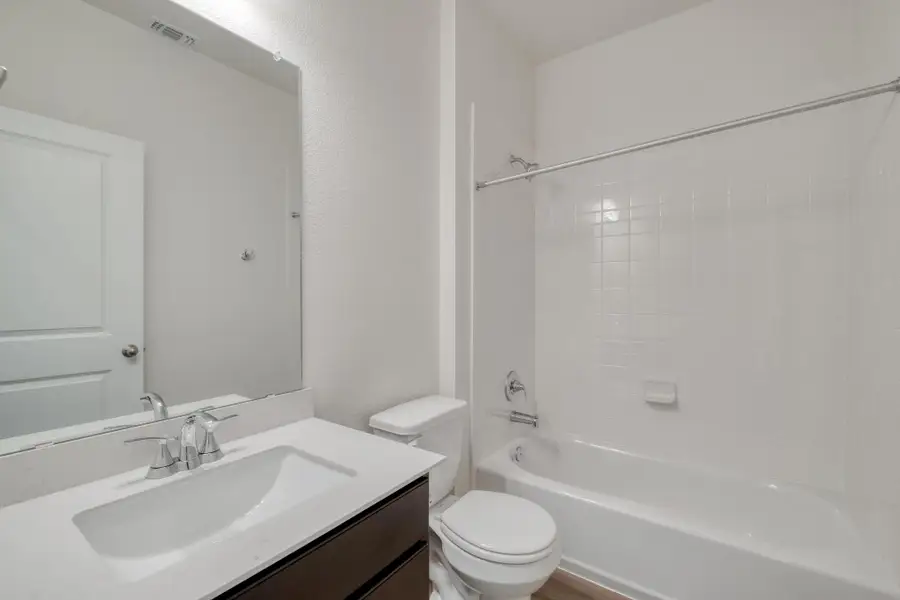 Furnished interior view inside a new home in River Bluff, Leander (Image 7). Furnished interior view inside a new home in River Bluff, Leander (Image 7).