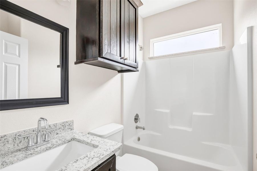 Full bath downstairs located between bedroom #2 and #3