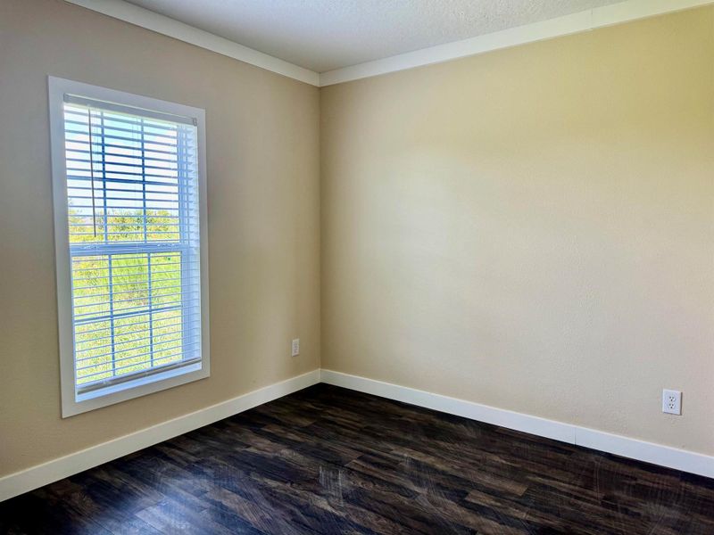 Spacious, unfurnished interior of a new home in , Okeechobee (Image 10).