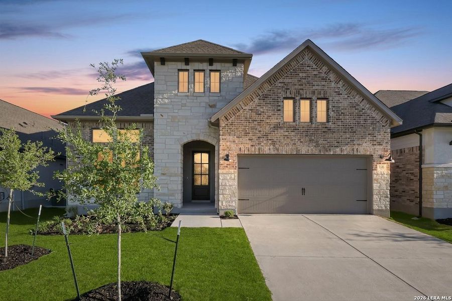 Front exterior of a new home in Nopal Valley, San Antonio, TX, highlighting curb appeal (Image 26).