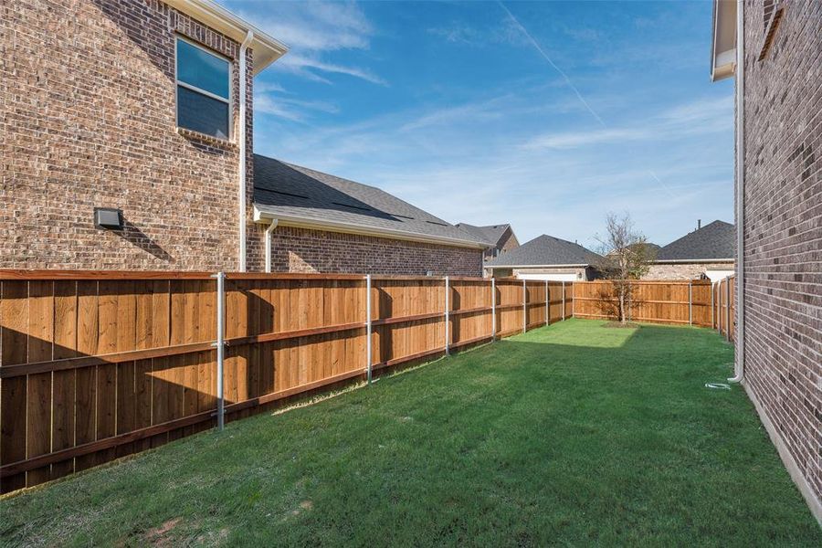 Exterior details and patio area of a home in Arbors at Legacy Hills, Celina (Image 3).