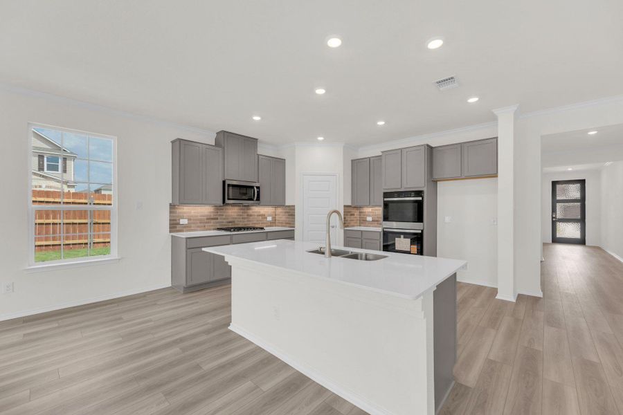 Furnished interior view inside a new home in Salerno - Classic Collection, Round Rock (Image 14). Furnished interior view inside a new home in Salerno - Classic Collection, Round Rock (Image 14).