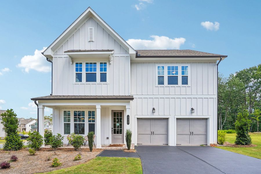 Representative exterior photo of a completed home built from the Manchester by Ashton Woods in East Harbor II at Chestatee, Dawsonville, GA (Image 1).