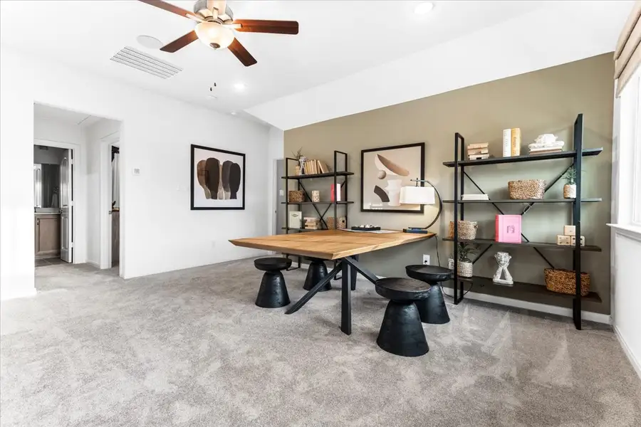 Furnished interior view inside a new home in The Reserve at Spiritas Ranch, Little Elm (Image 12).