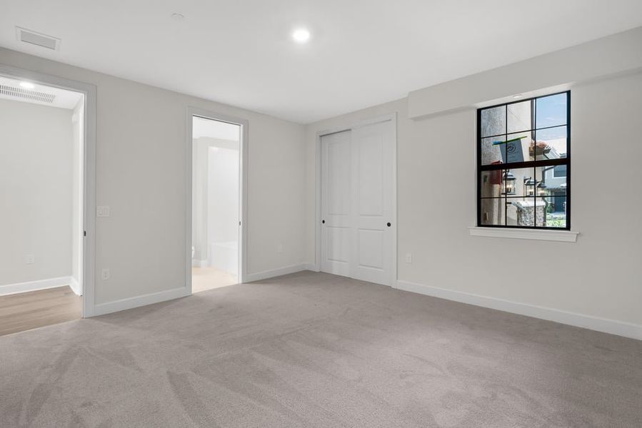 Spacious, unfurnished interior of a new home in Esplanade by the Islands Coach Homes, Naples (Image 18). Spacious, unfurnished interior of a new home in Esplanade by the Islands Coach Homes, Naples (Image 18).