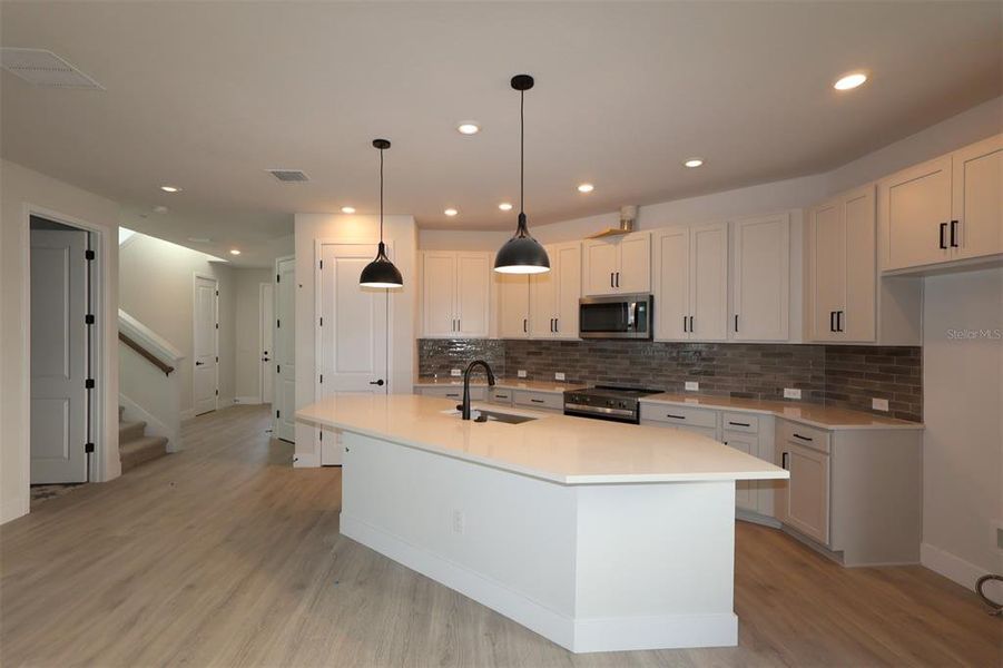 Furnished interior view inside a new home in Chapel Crossings - Garden Series, Wesley Chapel (Image 4). Furnished interior view inside a new home in Chapel Crossings - Garden Series, Wesley Chapel (Image 4).
