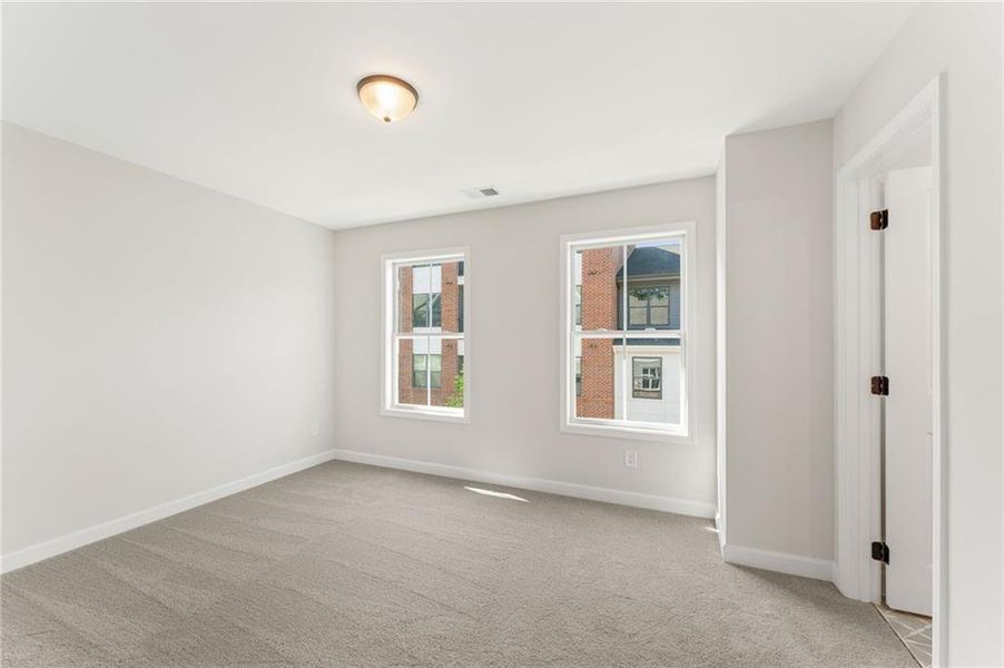 Spacious, unfurnished interior of a new home in Townes at South Main, Kennesaw (Image 23).