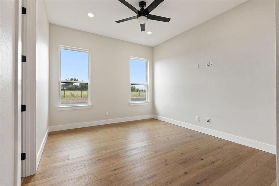 light wood-type
flooring, recessed lighting, and a ceiling fan light wood-type
flooring, recessed lighting, and a ceiling fan