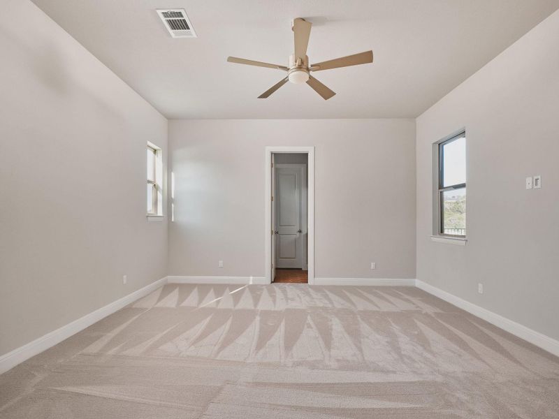 A private bedroom on the main level is ideal for guests or multigenerational living.