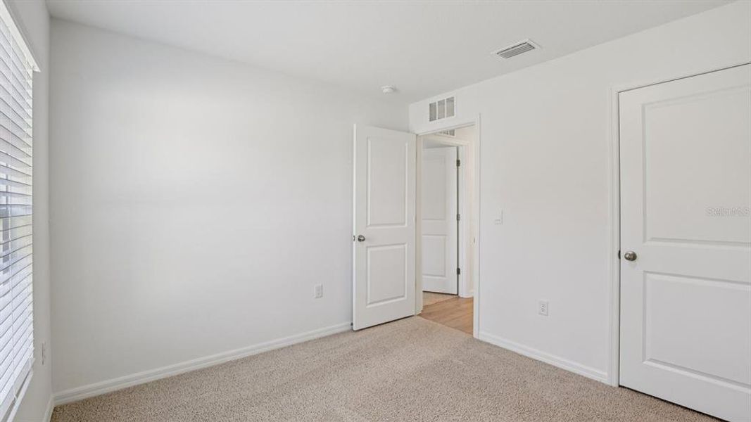 Spacious, unfurnished interior of a new home in , Dade City (Image 24).