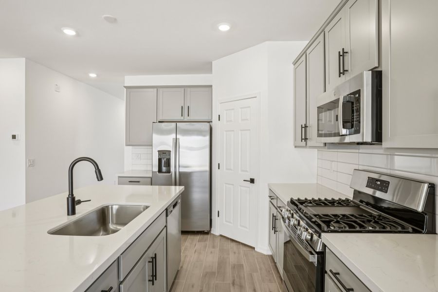 Kitchen. Finishes and options may vary by community