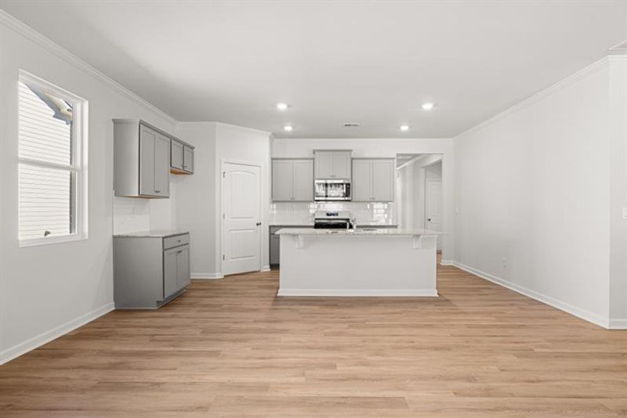 Furnished interior view inside a new home in Northwoods at Mirror Lake, Villa Rica (Image 5).